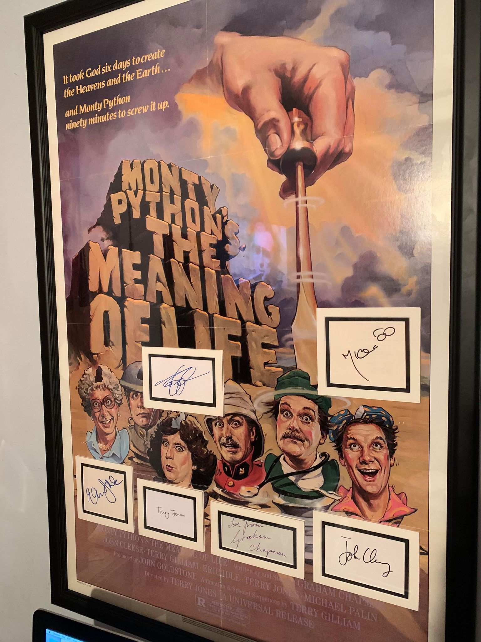 A poster signed by Monty Python actor John Cleese, Michael Palin, Terry Jones, Terry Gilliam, Graham Chapman, Eric Idle
